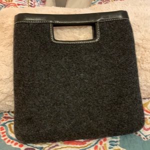 Stylish Banana Republic handbag grey with black leather handle. Perfect size!!